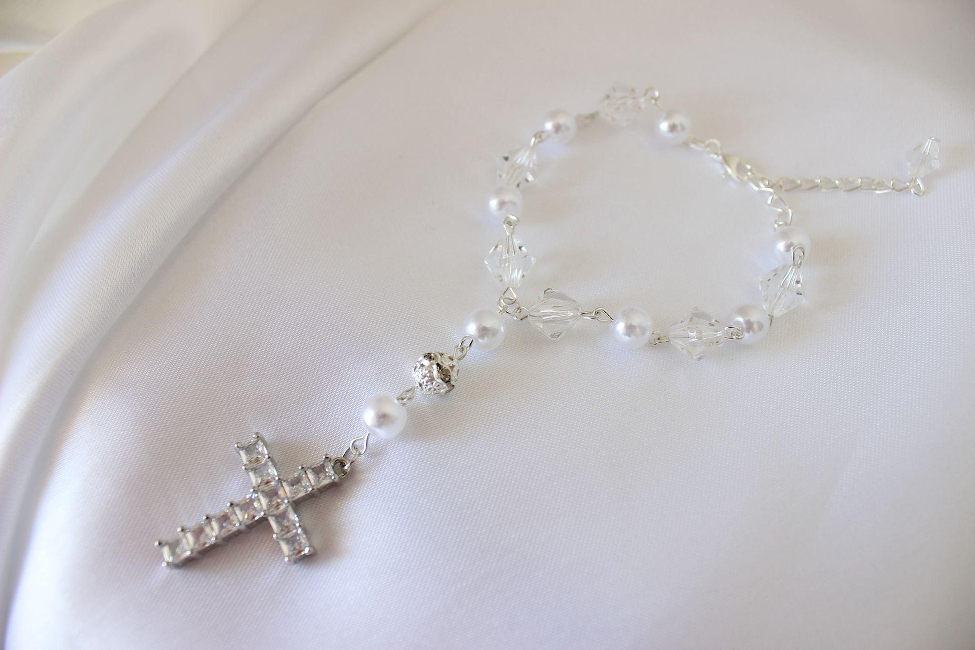 Amore Collective crystal and pearl single strand bridal rosary bracelet.